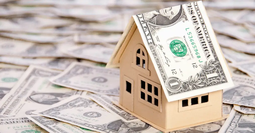 House with a dollar bill as the roof - does timing matter when buying a house?