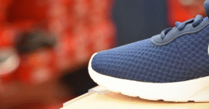 Athletic shoe in a sporting goods store - Foot Locker store closures