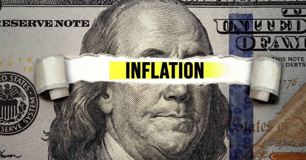 Hundred dollar bill with the words inflation