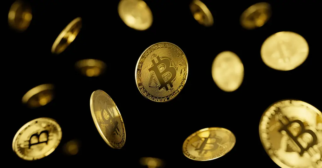 picture of Bitcoin coins falling - why is Bitcoin dropping